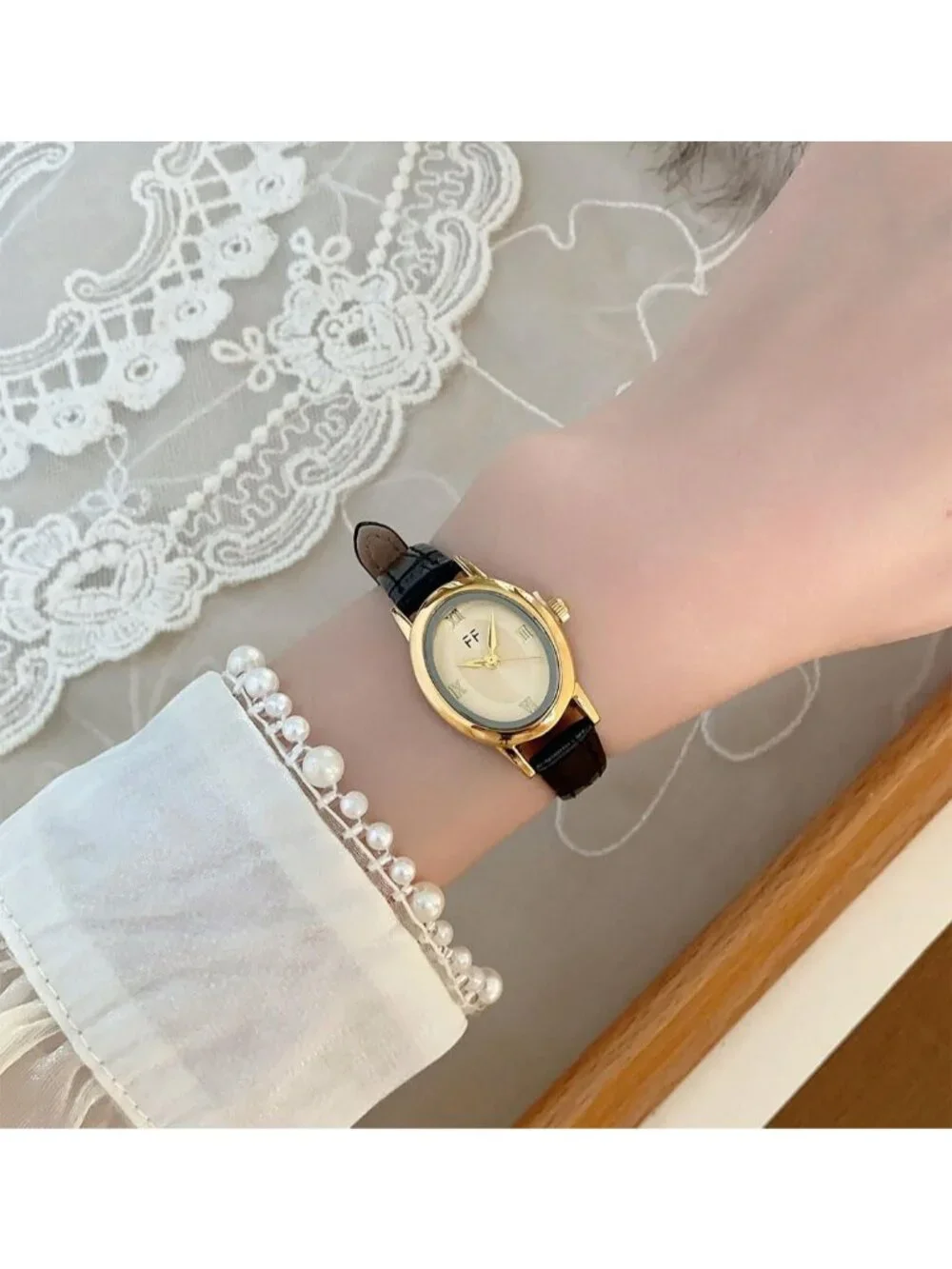 Women's Black Vintage Oval Analog Quartz Roman Numeral Dial Leather Strap Watch